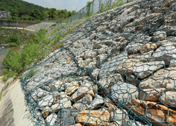 Gabion units at embankments of the trained river channel