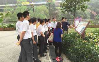 Students being briefed on the Lai Chi Kok Drainage Tunnel during a visit to the Butterfly Valley Road Pet Garden