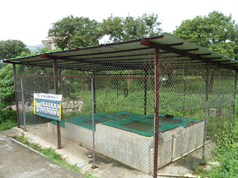 Temporary fish holding tanks with shelters for prevention of overheating; and security fence for avoidance of human disturbance