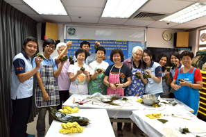 Engineering consultants visiting the SAGE Eastern Multi-service Centre for the Elderly on 13 June 2015 to make rice dumplings with seniors