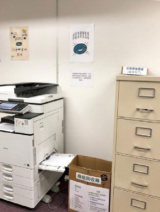 Newly introduced one-sided paper collection box next to a printer