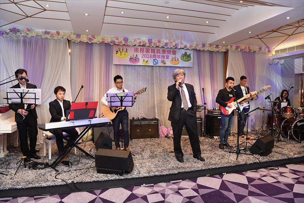 Mr. Edwin TONG Ka-hung, then Director of Drainage Services, jamming with the DSD Band