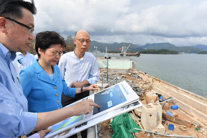 The Chief Executive, Mrs Carrie LAM (centre), accompanied by the Secretary for Environment, Mr WONG Kam-sing (right), and the Director of Drainage Services, Mr Edwin TONG Ka-hung (left), this afternoon (September 24) inspects the Sai Kung Sewage Treatment Works which were seriously damaged by the typhoon