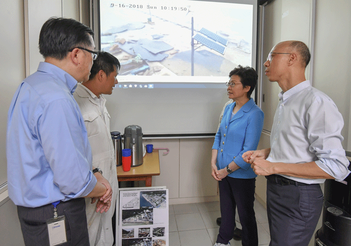 The Chief Executive, Mrs Carrie LAM (second right), this afternoon (September 24) inspects the Sai Kung Sewage Treatment Works which were seriously damaged by the typhoon, and meets staff of the Drainage Services Department who were on duty during the typhoon. Looking on are Secretary for Environment, Mr WONG Kam-sing (first right), and the Director of Drainage Services, Mr Edwin TONG Ka-hung (first left)