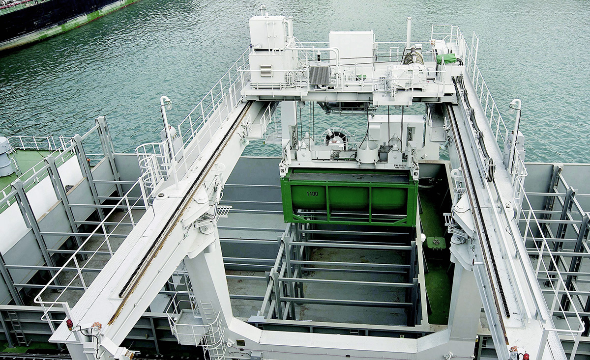 Loading and unloading of sludge containers