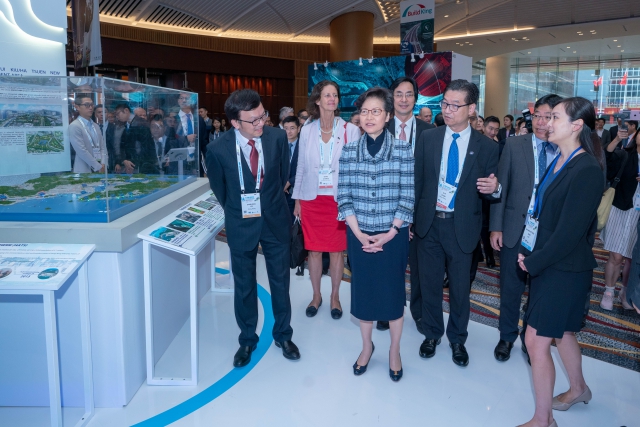 The 8th International Water Association Asia Pacific Regional Group Conference and Exhibition opened at the Hong Kong Convention and Exhibition Centre today (October 31). Picture shows the Chief Executive, Mrs Carrie Lam (front row, second left), visiting the exhibition area showcasing the latest products and technologies of water supply, flood prevention and sewage treatment from around the world