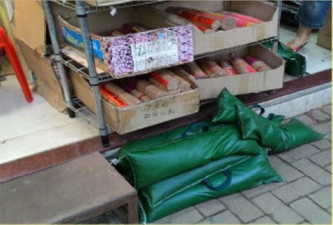 To provide sand bags to flood-vulnerable shops